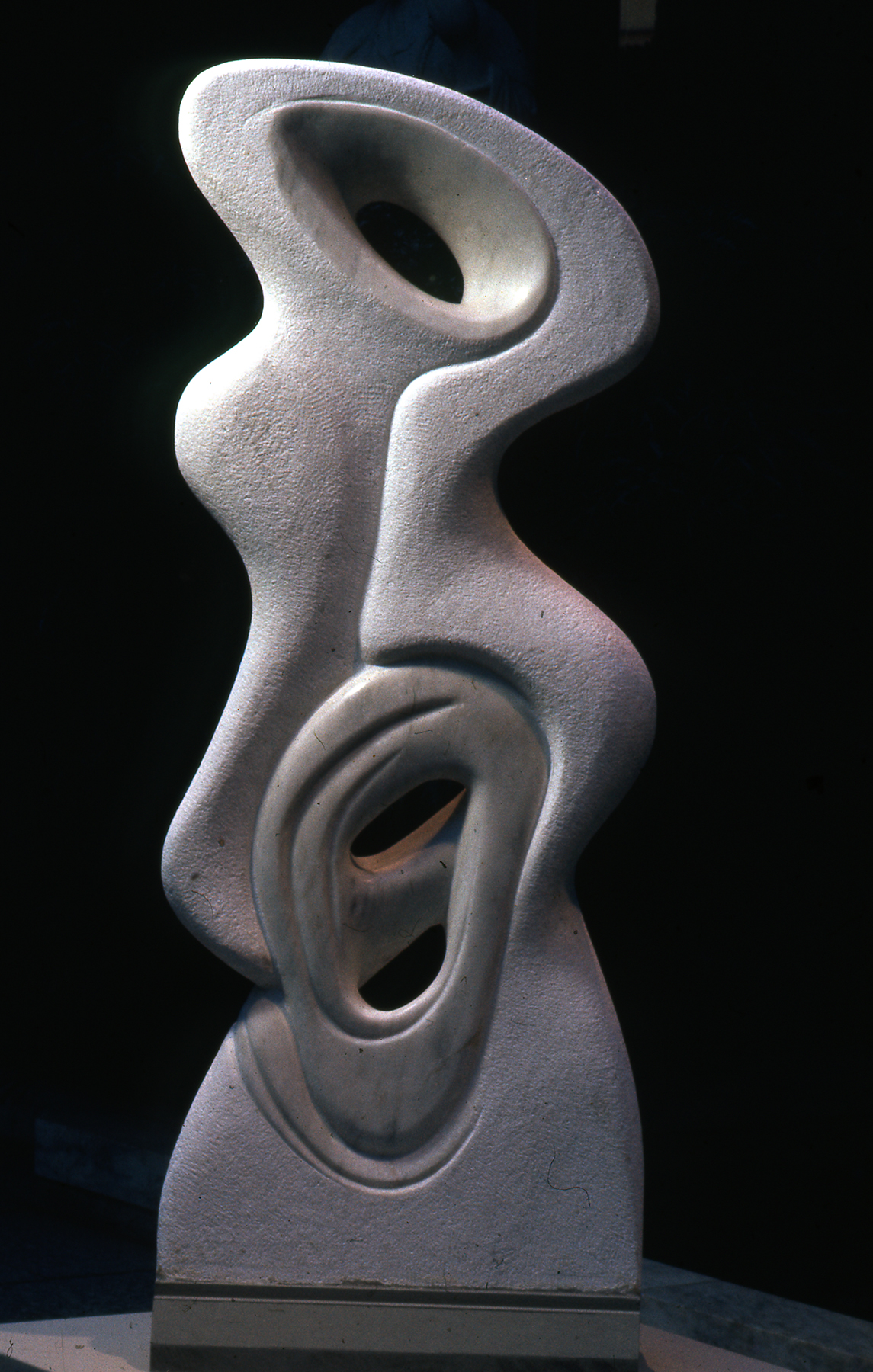 Two Sides of Woman Smooth gray carved marble